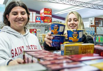 two girls in food pantry at Saint Joseph's University