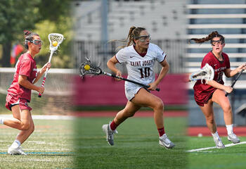 Three female lacrosse players on field