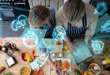 A couple looking at their produce with computer renderings floating above.
