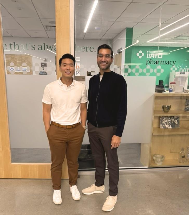 Josh Kim and Jay Patel in front of the new Ivira Health Community Pharmacy Learning Center