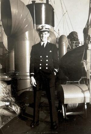 Cairns in uniform aboard a ship