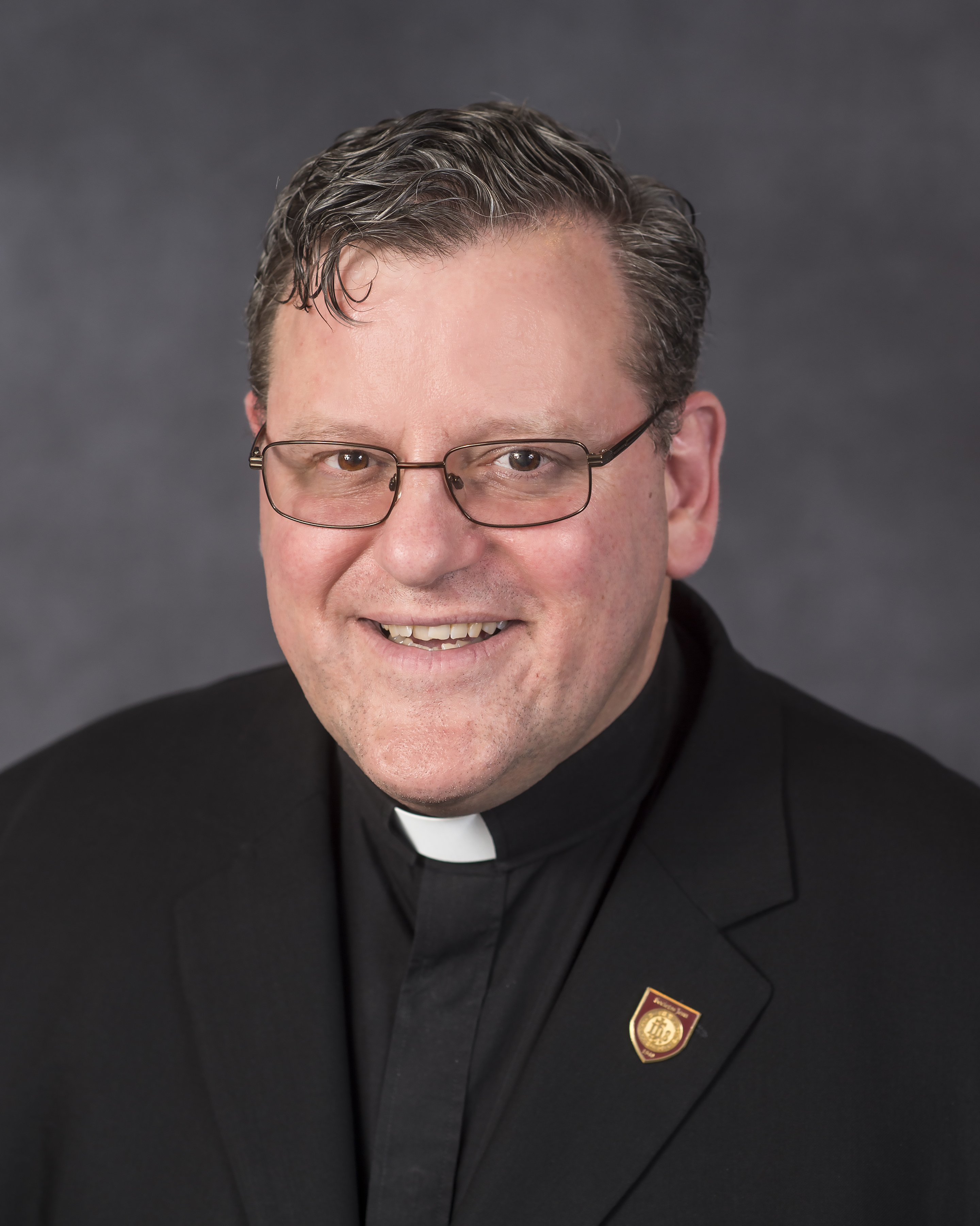 Rev. Daniel Joyce, S.J.