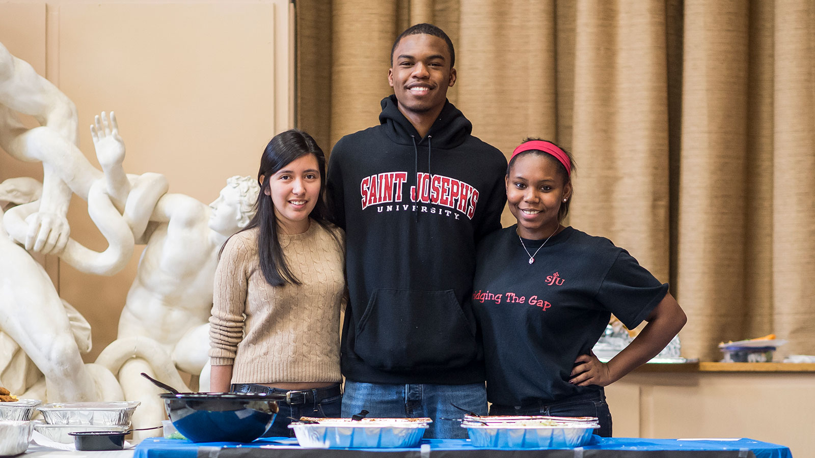 three students at taste of the world event