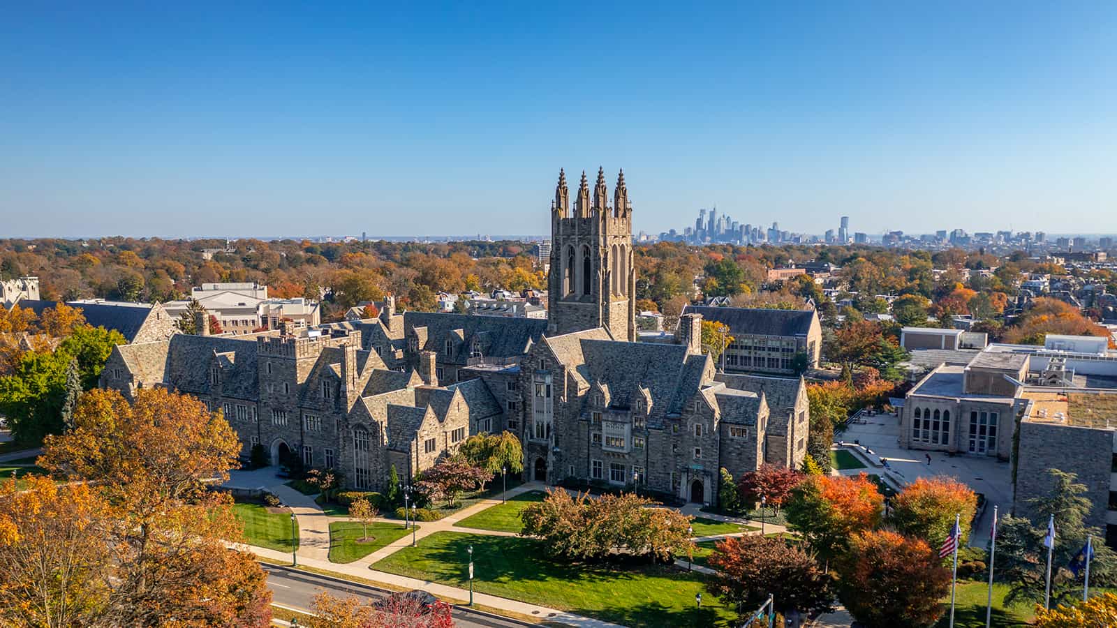 Aerial view of Saint Joseph's University campus with Philadelphia skyline.