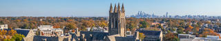 Aerial shot of Saint Joseph's University and the Philadephia skyline in the fall