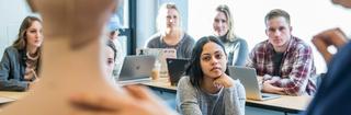 female saint joseph's university student in a health studies classroom