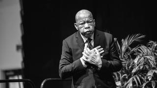 Rep. John Lewis delivering a speech on stage