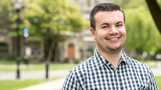 Will Marsh standing outside on campus