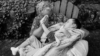 maria kefalas holding her daughter calliope