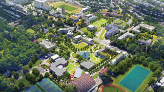 campus buildings surrounded by trees