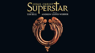 Text "Jesus Christ Superstar, Lyrics by Tim Rice, Music by Andrew Lloyd Webber" on a black background