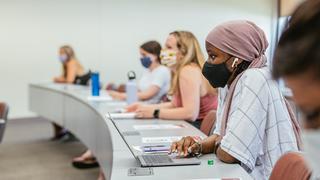 Students with mask in a college classsroom