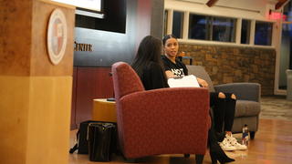 Natasha Cloud, facing camera, is interviewed by Stephanie Tryce