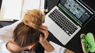 female student looking at a laptop