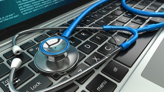 stethoscope on a keyboard