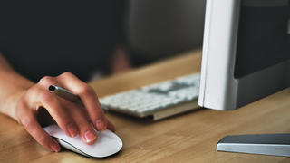 person using a computer mouse