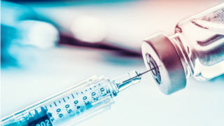 Medical syringe with a vaccine