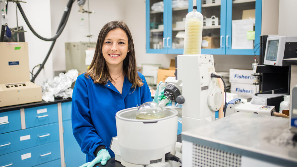 A photo of Elise Brutschea in her laboratory