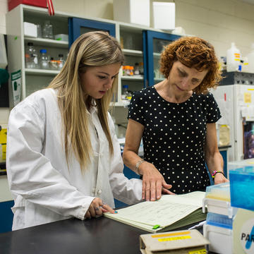 McNulty Scholar inside a lab with professor