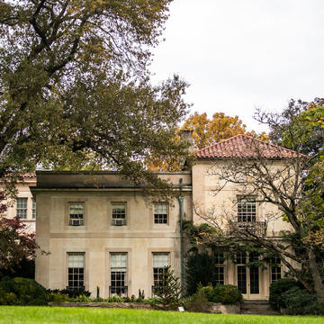 The Barnes' beautiful architecture peeks through the surround trees and foliage
