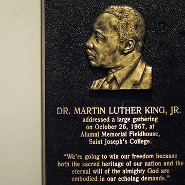 A plaque honoring MLK's visit to SJU reads: "Dr. Martin Luther King Jr. addressed a large gathering on October 26, 1967, at Alumni Memorial Fieldhouse, Saint Joseph's College