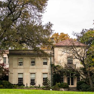 The Barnes' beautiful architecture peeks through the surround trees and foliage