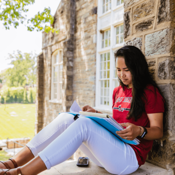 Saint Joseph's University student studying for class