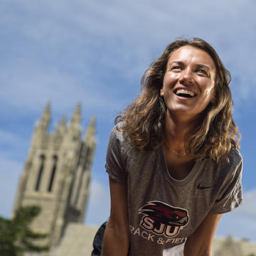 Saint Joseph's University student athlete Elaine Estes standing in front of Barbelin Hall