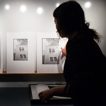 Saint Joseph's Art student setting up photographs
