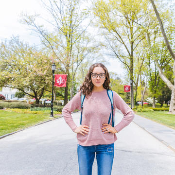 Saint Joseph's University student standing on campus