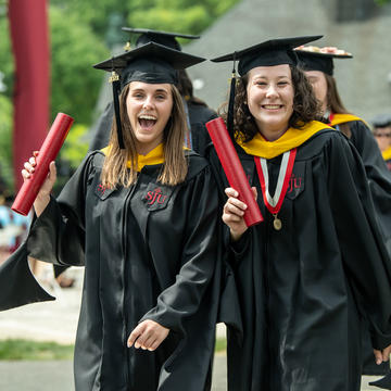 Two students at graduation