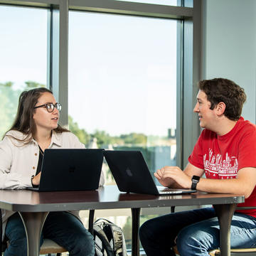 Two students talking on Saint Joseph's University's campus