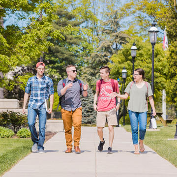 Saint Joseph's University students walking on campus.