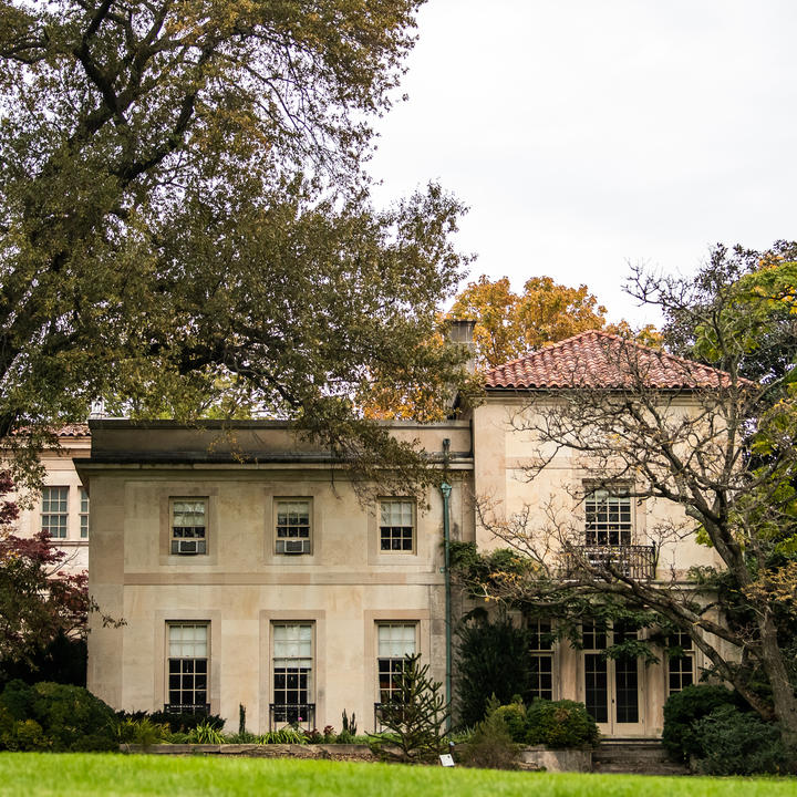 The Barnes' beautiful architecture peeks through the surround trees and foliage
