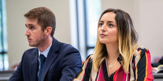two Saint Joseph's University business students inside a classroom