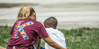 Kinney SCHOLARS with a student