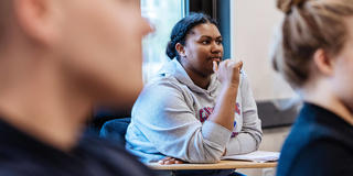 female saint joseph's student inside the classroom