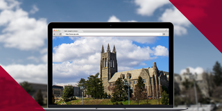 Laptop with Barbelin Hall on the screen from Sweeney field