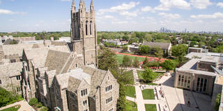 Aerial view of Saint Joseph's University campus with Philadelphia skyline in the background