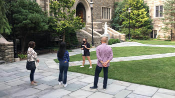 An SJU campus tour near Barbelin Hall.
