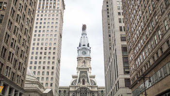 philadephia city hall tower surrounded by buildings