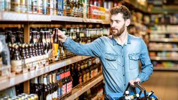 Man shops for beer