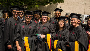 A group of smiling graduates