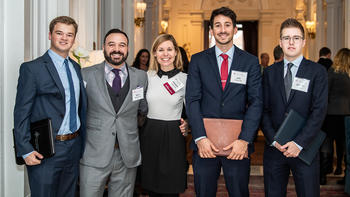 Real estate alumni at networking event.