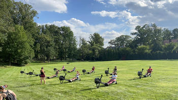 Participants in an outdoor rowing class.