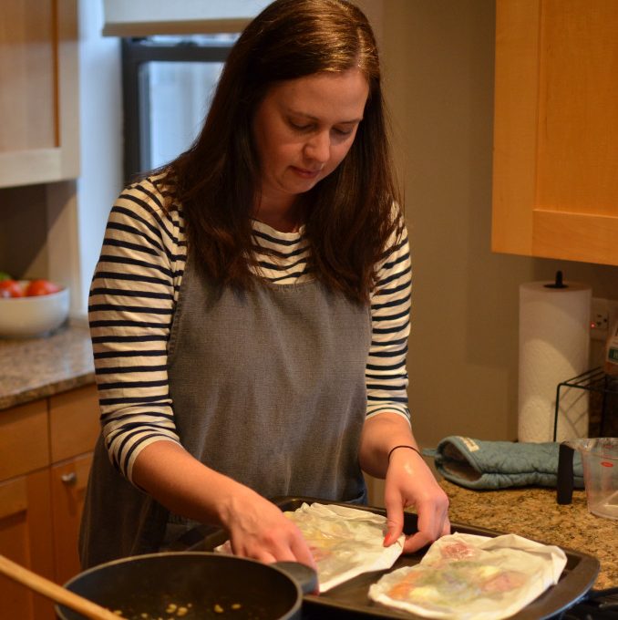 Amy Cavanaugh, dining editor at Chicago Magazine, cooking in her kitchen