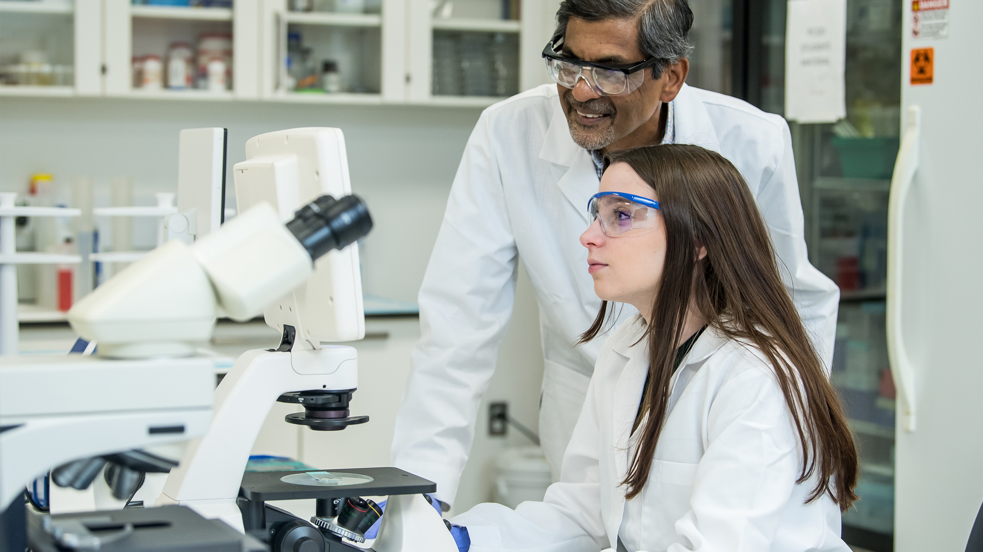 Student and faculty member working in the lab