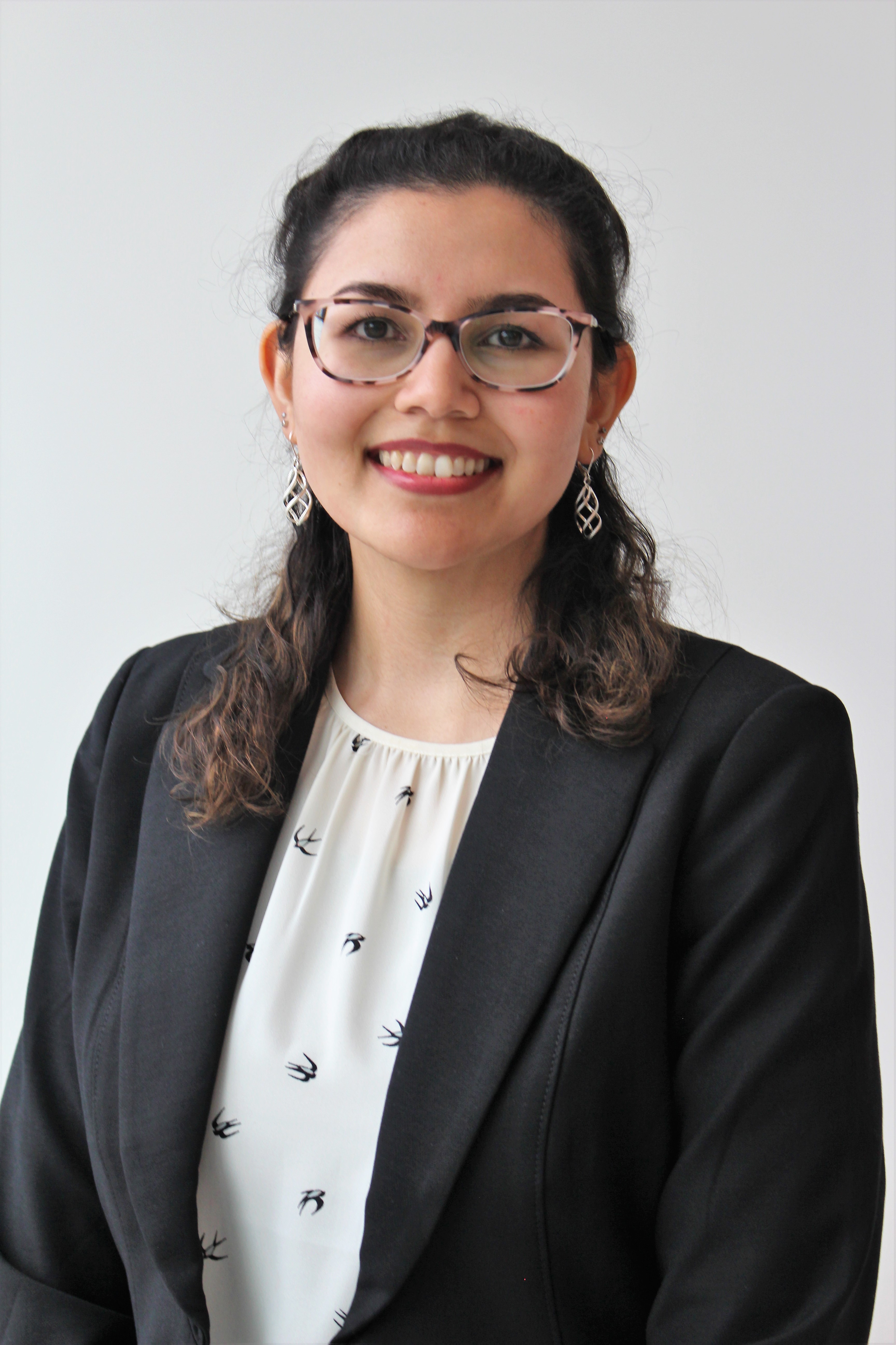 Headshot of Ghina Moyeen, PharmD, M.S.