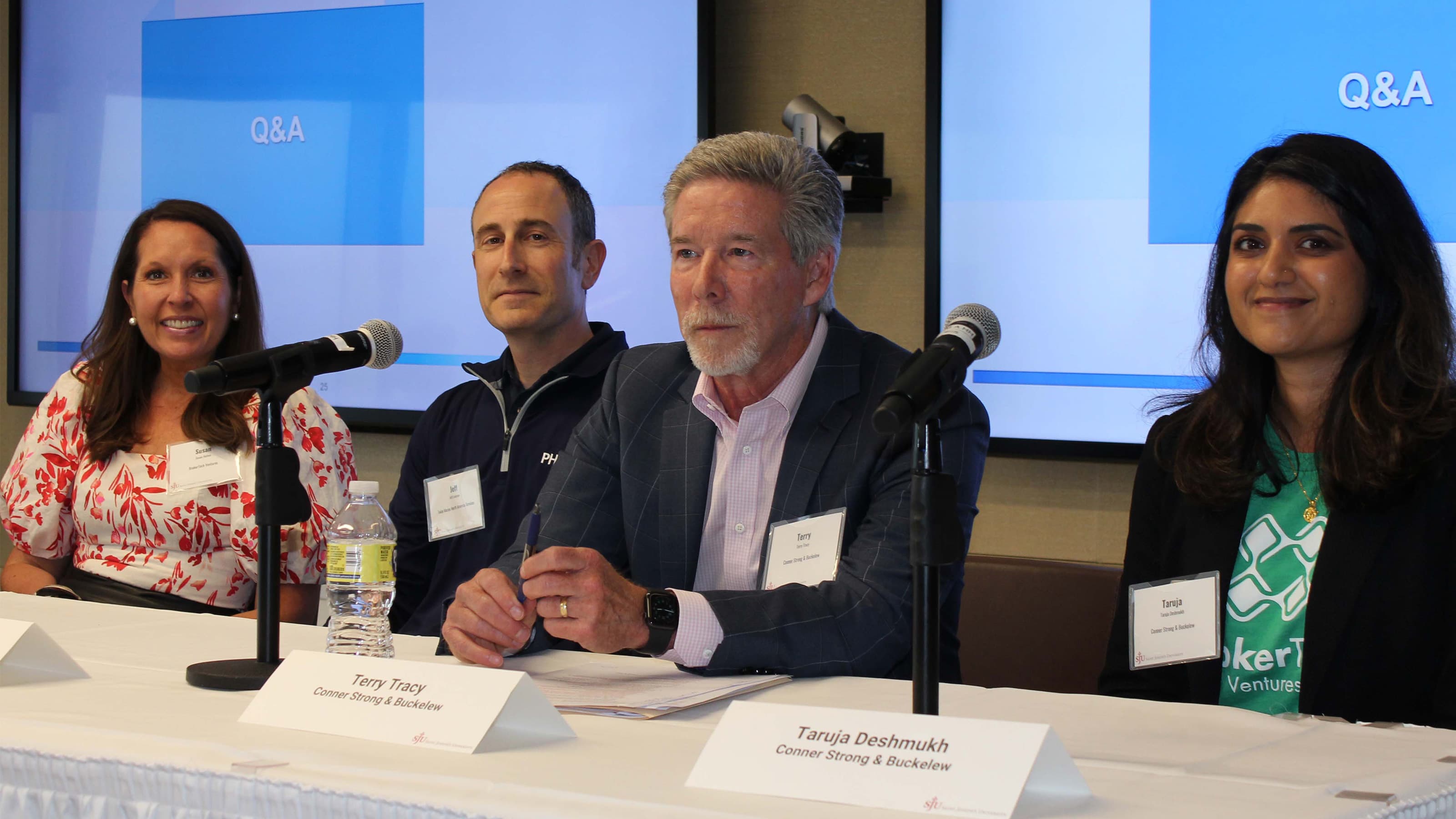 Panelists seated at the BrokerTech Ventures panel discussion