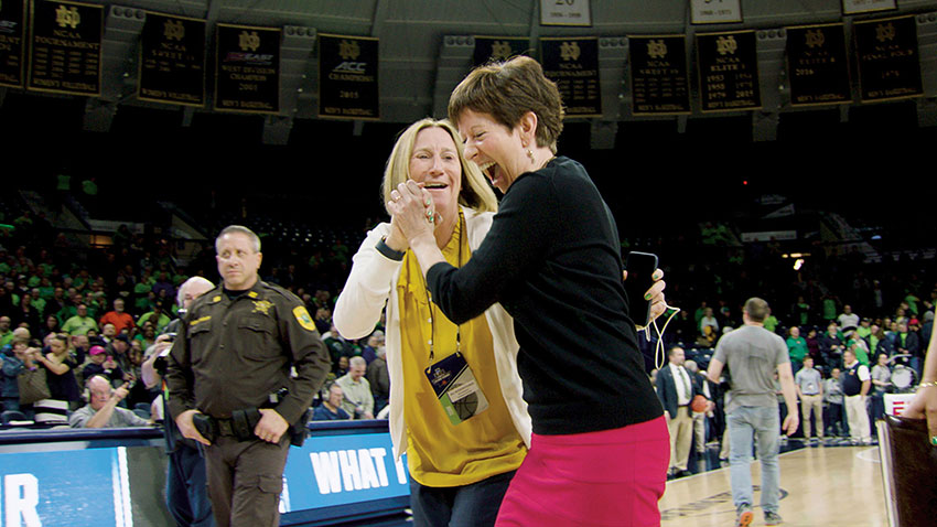 Jill Bodensteiner and Muffet McGraw in a basketball court